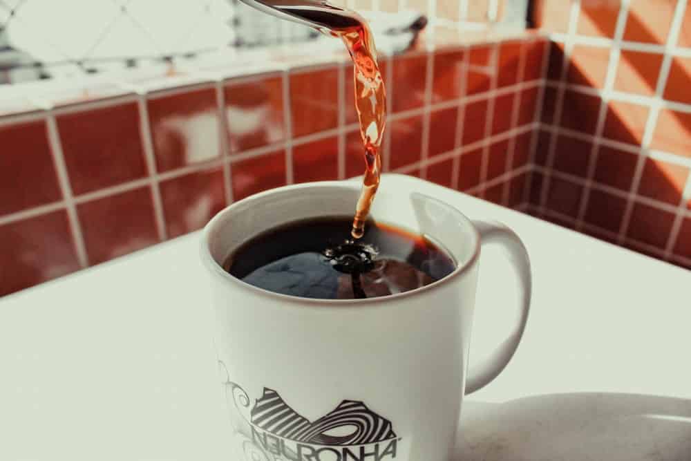 pouring black coffee